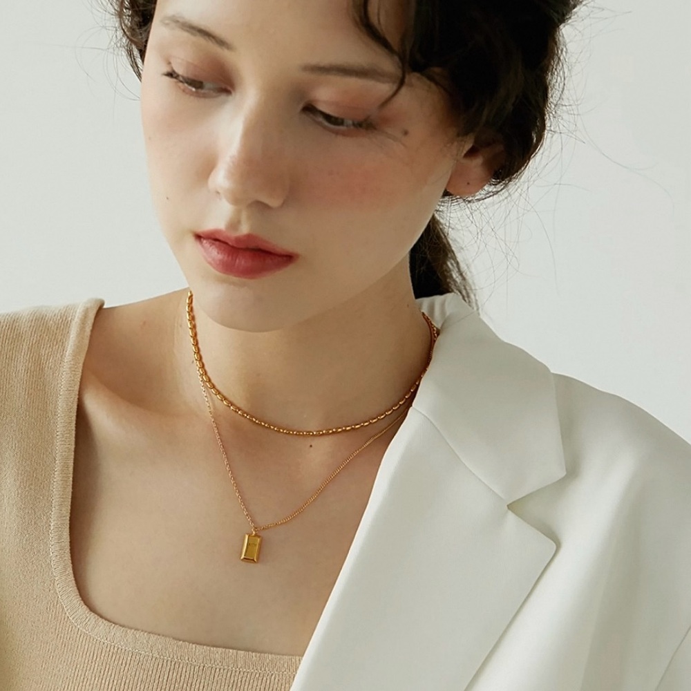 Gold tone double necklace